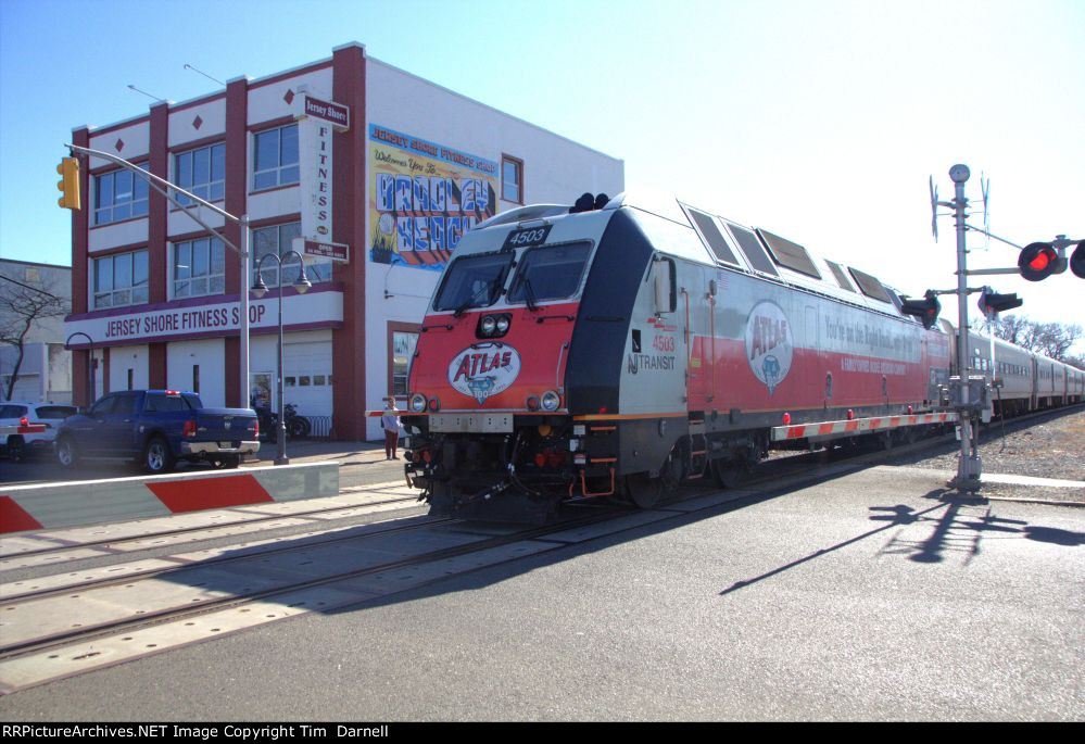 NJT 4503 passing the Bradley Beach postcard sign